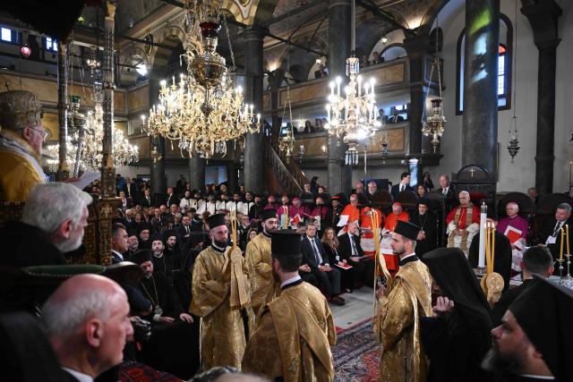 Pope Leo XIV and Patriarch Bartholomew I (L) take part in a Divine Liturgy at Patriarchal Church of Saint George, in Istanbul on November 30, 2025. (Photo by YASIN AKGUL / AFP)