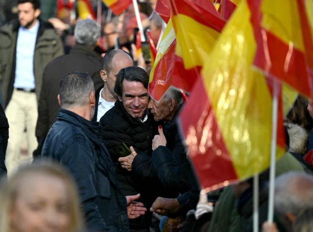 Spain's former Prime Minister Jose Maria Aznar takes part in a demonstration against corruption called by the right-wing opposition party Partido Popular (PP) in front of Debod Temple in Madrid on November 30, 2025. (Photo by Javier SORIANO / AFP)
