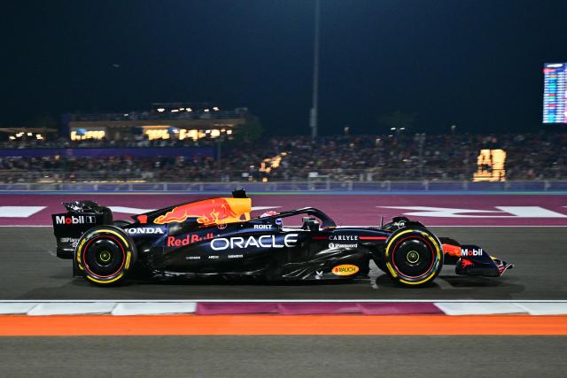 Red Bull Racing's Dutch driver Max Verstappen drives during the Formula One Qatar Grand Prix at the Lusail International Circuit in Lusail on November 30, 2025. (Photo by Andrej ISAKOVIC / AFP)
