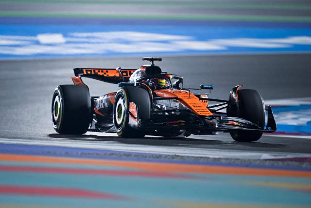 McLaren's Australian driver Oscar Piastri drives during the Formula One Qatar Grand Prix at the Lusail International Circuit in Lusail on November 30, 2025. (Photo by Mahmud HAMS / AFP)