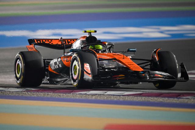 McLaren's British driver Lando Norris drives during the Formula One Qatar Grand Prix at the Lusail International Circuit in Lusail on November 30, 2025. (Photo by Mahmud HAMS / AFP)