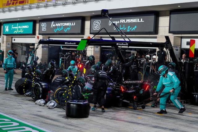 Mercedes' Italian driver Kimi Antonelli makes a pit stop during the Formula One Qatar Grand Prix at the Lusail International Circuit in Lusail on November 30, 2025. (Photo by Altaf Qadri / POOL / AFP)