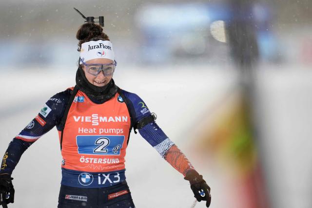 France's Lou Jeanmonnot crosses the finish line to win with her team the mixed relay event of the IBU Biathlon World Cup in Oestersund, Sweden on November 30, 2025. (Photo by Bjorn LARSSON ROSVALL / various sources / AFP) / Sweden OUT