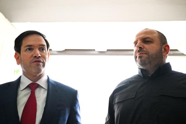 (L/R) US Secretary of State Marco Rubio and Secretary of the National Security and Defense Council of Ukraine Rustem Umerov speak to reporters after their meeting in Hallandale Beach, Florida on November 30, 2025. Rubio hailed talks with a Ukrainian delegation in Florida as "very productive," but cautioned that more work was required to halt Russia's war with its neighbor. (Photo by CHANDAN KHANNA / AFP)
