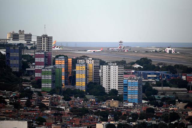 General view of the Simon Bolivar International Airport in Maiquetia, La Guaira State, Venezuela, on November 30, 2025. US President Donald Trump sharply escalated his threats against Venezuela on Saturday with an ominous warning that the country's airspace should be considered "closed," raising fears of imminent military action. (Photo by Federico PARRA / AFP)