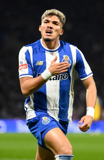 FC Porto's Brazilian forward #07 William Gomes celebrates scoring the opening goal during the Portuguese League football match between FC Porto and GD Estoril Praia at Dragao stadium in Porto on November 30, 2025. (Photo by Miguel RIOPA / AFP)