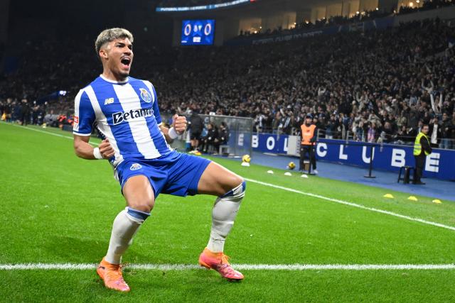 FC Porto's Brazilian forward #07 William Gomes celebrates scoring the opening goal during the Portuguese League football match between FC Porto and GD Estoril Praia at Dragao stadium in Porto on November 30, 2025. (Photo by Miguel RIOPA / AFP)