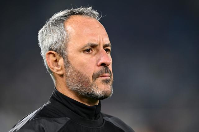 Pau's French head coach Sebastien Piqueronies looks on before the French Top 14 rugby union match between Section Paloise Bearn Pyrenees (Pau) and Stade Rochelais (La Rochelle) at Stade du Hameau in Pau, south-western France on November 30, 2025. (Photo by Gaizka IROZ / AFP)
