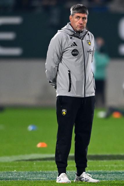La Rochelle's Irish coach Ronan O'Gara  looks on before the French Top 14 rugby union match between Section Paloise Bearn Pyrenees (Pau) and Stade Rochelais (La Rochelle) at Stade du Hameau in Pau, south-western France on November 30, 2025. (Photo by Gaizka IROZ / AFP)