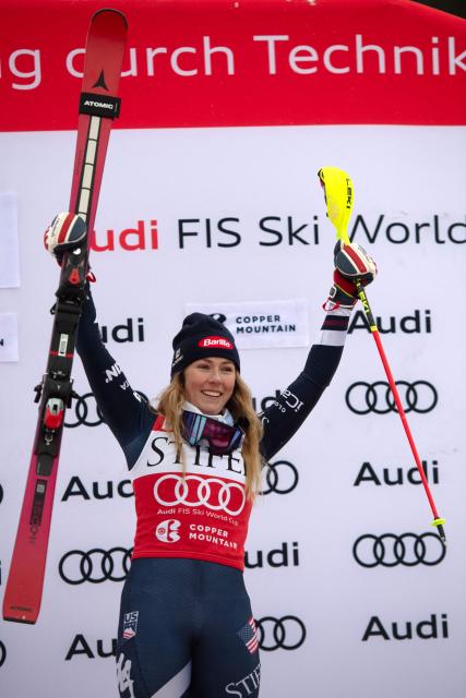 US skier Mikaela Shiffrin celebrates in the podium after winning the Women's Slalom during the Stifel Copper Cup 2025 at Copper Mountain, part of the FIS Alpine Ski World Cup, in Copper Mountain, Colorado on November 30, 2025. (Photo by Jason Connolly / AFP)