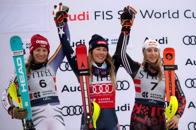 (L-R) German Lena Duerr, second place, Mikaela Shiffrin of the US, first place, and Albanian Lara Colturi, third place, pose in the podium of the Women's Slalom during the Stifel Copper Cup 2025 at Copper Mountain, part of the FIS Alpine Ski World Cup, in Copper Mountain, Colorado on November 30, 2025. (Photo by Jason Connolly / AFP)