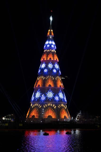 A floating Christmas tree is pictured at Botafogo waterfront in Rio de Janeiro, Brazil on November 30, 2025. (Photo by Pablo PORCIUNCULA / AFP)