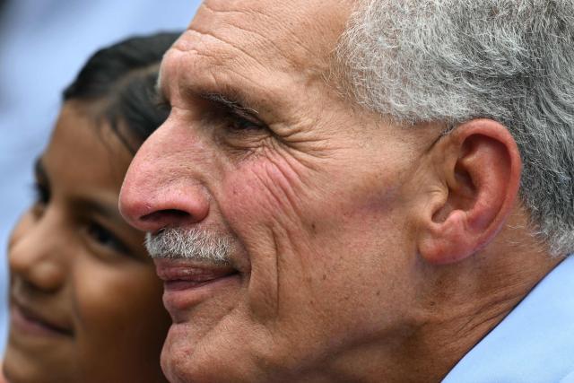 Honduras presidential candidate of the National Party Nasry Asfura gestures as he leaves after voting in Tegucigalpa on November 30, 2025. Hondurans voted for president on November 30, 2025, amid threats by US President Donald Trump to cut aid to the country if his preferred candidate loses. (Photo by Marvin RECINOS / AFP)