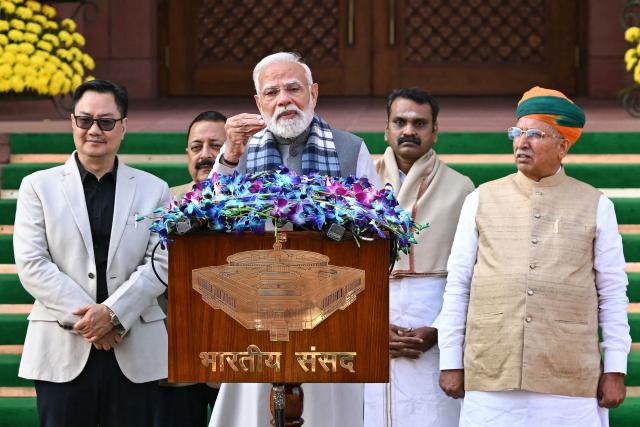 India's Prime Minister Narendra Modi (C) addresses the media on the first day of the Parliament's winter session in New Delhi on December 1, 2025. (Photo by Sajjad HUSSAIN / AFP)