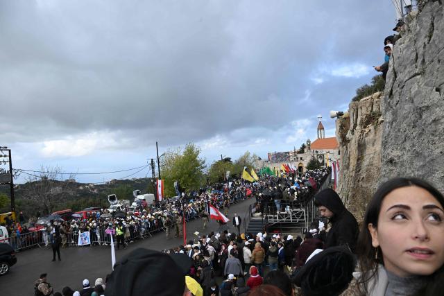 Crowds gather for the arrival of Pope Leo XIV to the tomb of Saint Charbel Makhlouf or Mar Charbel in Arabic, a Lebanese Maronite monk and priest, at the Saint Maron monastery in the mountainous village of Annaya, north of the capital Beirut on December 1, 2025. Pope Leo XIV is set to urge peace and unity on his second day in Lebanon on December 1, 2025, bringing a message of hope to young people whose faith in their crisis-hit country has dwindled. (Photo by JOSEPH EID / AFP)