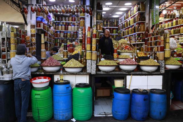 Souk Ablouh is one of the traditional markets in the Medina of Marrakech, mainly known for selling olives located off the Jemaa el-Fna Square or Jamaa Lafna, listed as UNESCO Cultural Heritage site, in the heart of the Medina of the city of Marrakech on November 30, 2025. (Photo by Abdel Majid BZIOUAT / AFP)