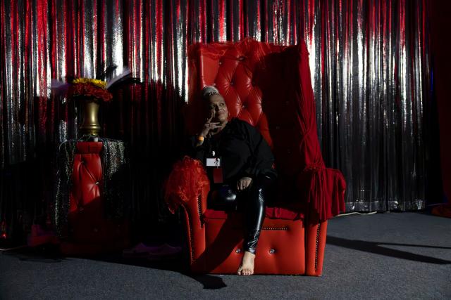 EDITORS NOTE: Graphic content / Vanessa Lisa Asvat, or Mistress Cleo, poses for a picture at the Fetishaven booth at the Love Expo in Pretoria, on November 29, 2025. Love Expo is an annual event featuring more than a hundred exhibitors, live performances and informative workshops showcasing trends in sexual wellness, enterteinment and lifestyle. (Photo by CAMILLA RICHETTI / AFP)