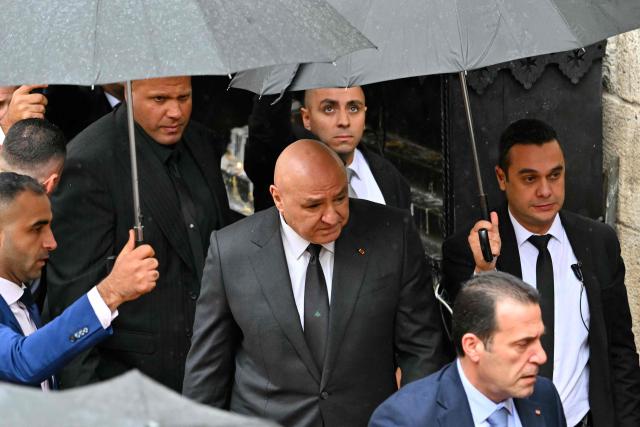 Lebenon's President Joseph Aoun attends a visit of Pope Leo XIV to the tomb of Saint Charbel Makhlouf at the Saint Maron monastery in the mountainous village of Annaya on December 1, 2025.  (Photo by Andreas SOLARO / AFP)