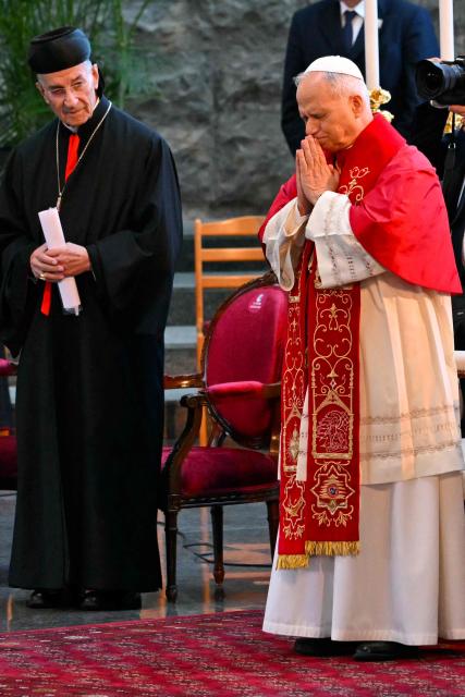 Pope Leo XIV arrives for a meeting with bishpops, priests consacrated persons and personal workers at the shrine of Our Lady of Lebanon in Harissa, northeast of the capital Beirut, on December 1, 2025.  (Photo by Andreas SOLARO / AFP)