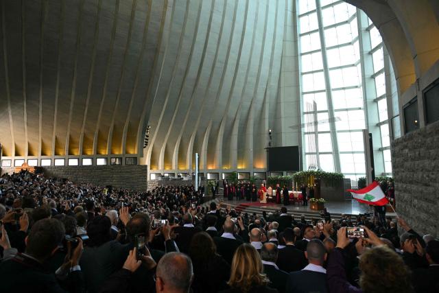 Pope Leo XIV attends a meeting with bishpops, priests consacrated persons and personal workers at the shrine of Our Lady of Lebanon in Harissa, northeast of the capital Beirut, on December 1, 2025.  (Photo by Andreas SOLARO / AFP)