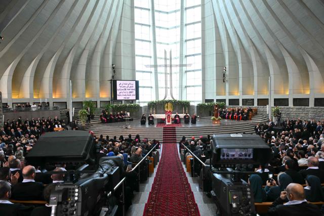 TOPSHOT - Pope Leo XIV addresses the crowd during a meeting with bishpops, priests consacrated persons and personal workers at the shrine of Our Lady of Lebanon in Harissa, northeast of the capital Beirut, on December 1, 2025.  (Photo by Andreas SOLARO / AFP)