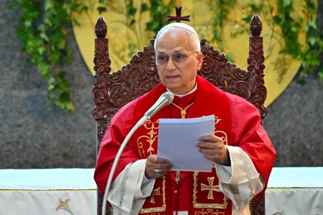 Pope Leo XIV addresses the crowd during a meeting with bishpops, priests consacrated persons and personal workers at the shrine of Our Lady of Lebanon in Harissa, northeast of the capital Beirut, on December 1, 2025.  (Photo by Andreas SOLARO / AFP)