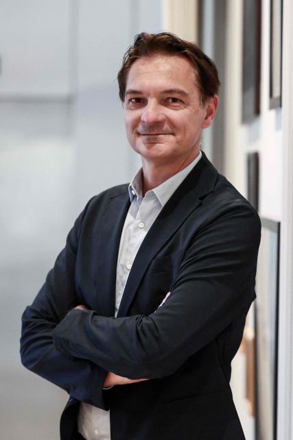 French holiday company ClubMed (Club Mediterranee) CEO Stephane Maquaire poses during a photo session in Paris on December 1, 2025. (Photo by Thibaud MORITZ / AFP)