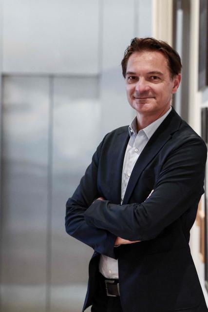 French holiday company ClubMed (Club Mediterranee) CEO Stephane Maquaire poses during a photo session in Paris on December 1, 2025. (Photo by Thibaud MORITZ / AFP)