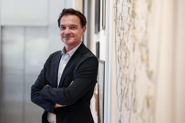 French holiday company ClubMed (Club Mediterranee) CEO Stephane Maquaire poses during a photo session in Paris on December 1, 2025. (Photo by Thibaud MORITZ / AFP)