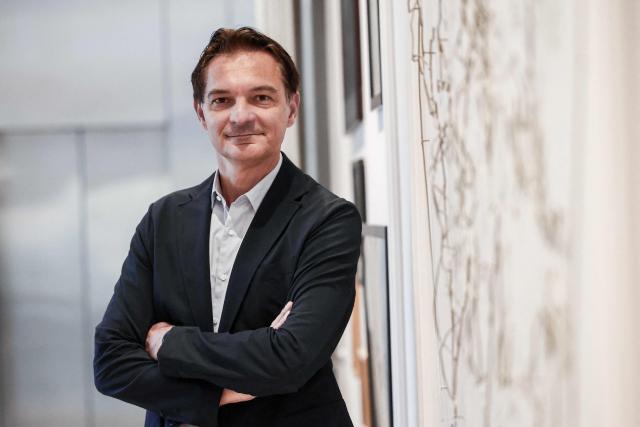 French holiday company ClubMed (Club Mediterranee) CEO Stephane Maquaire poses during a photo session in Paris on December 1, 2025. (Photo by Thibaud MORITZ / AFP)