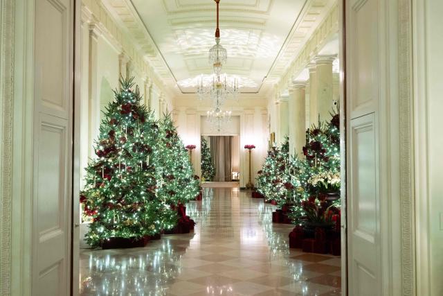 Christmas decorations are seen in the Cross Hall of the White House in Washington, DC, December 1, 2025, during a Christmas decoration media tour. (Photo by SAUL LOEB / AFP)