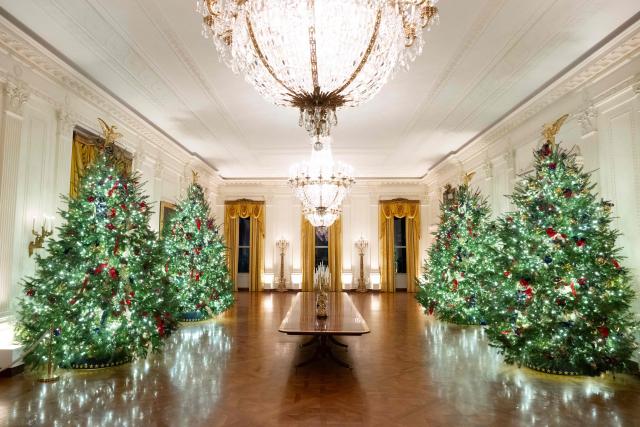 Christmas trees and decorations are seen in the East Room of the White House in Washington, DC, December 1, 2025, during a Christmas decoration media tour. (Photo by SAUL LOEB / AFP)