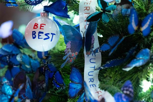 An ornament reading "Be Best" hangs on a tree as Christmas decorations are seen at the White House in Washington, DC, December 1, 2025. (Photo by SAUL LOEB / AFP)