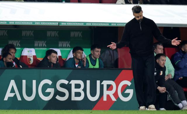 (FILES) Augsburg's German head coach Sandro Wagner reacts at the end of the German first division Bundesliga football match between FC Augsburg and Borussia Dortmund in Augsburg, southern Germany on October 31, 2025. Crisis-stricken Bundesliga club FC Augsburg has parted ways with coach Sandro Wagner. The 38-year-old had only taken over the position in the summer. After twelve match days, FCA is in 14th place with just ten points. (Photo by Alexandra BEIER / AFP) / DFL REGULATIONS PROHIBIT ANY USE OF PHOTOGRAPHS AS IMAGE SEQUENCES AND/OR QUASI-VIDEO