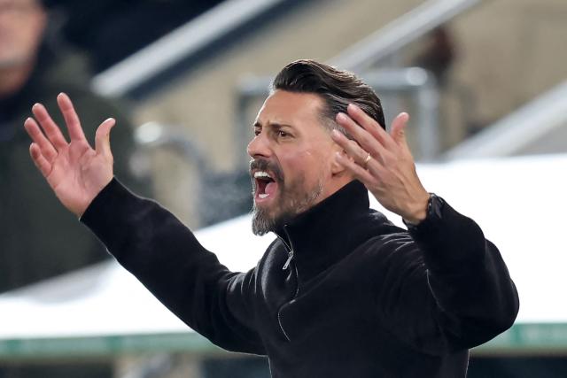 (FILES) Augsburg's German head coach Sandro Wagner reacts during the German first division Bundesliga football match between FC Augsburg and Borussia Dortmund in Augsburg, southern Germany on October 31, 2025. Crisis-stricken Bundesliga club FC Augsburg has parted ways with coach Sandro Wagner. The 38-year-old had only taken over the position in the summer. After twelve match days, FCA is in 14th place with just ten points. (Photo by Alexandra BEIER / AFP) / DFL REGULATIONS PROHIBIT ANY USE OF PHOTOGRAPHS AS IMAGE SEQUENCES AND/OR QUASI-VIDEO
