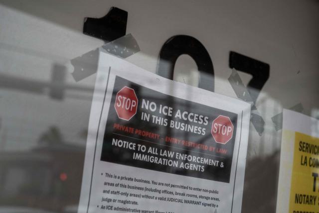 A sign on a Hispanic business displays legal rights, in Kenner, Louisiana, on December 1, 2025. According to US media reports, US Immigration and Customs Enforcement (ICE) and US Customs and Border Patrol are expected to begin a large-scale immigration enforcement operation known as "Swamp Sweep" in Southern Louisiana and Mississippi. (Photo by Adam GRAY / AFP)