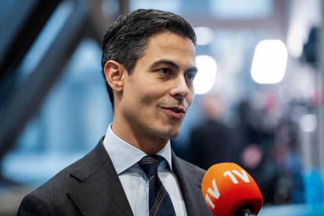 Dutch election winner and D66 party leader Rob Jetten speaks to the press as he leaves a meeting regarding the formation of the coalition in The Hague, on December 1, 2025. (Photo by Lina Selg / ANP / AFP) / Netherlands OUT