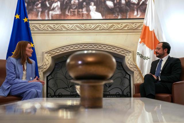 Cyprus' President Nikos Christodoulides (R) meets with European Parliament President Roberta Metsola at the Presidential Palace in Nicosia on December 1, 2025. (Photo by Petros KARADJIAS / POOL / AFP)