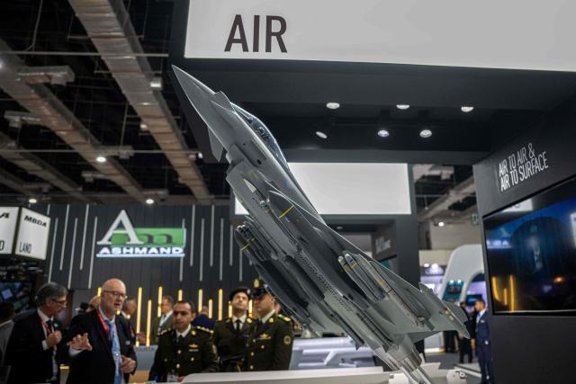 Egyptian army officers attend the opening day of the 4th edition of Egypt Defence Expo (EDEX-2025), at the Cairo International Exhibition Centre in Cairo on December 1, 2025. (Photo by Khaled DESOUKI / AFP)