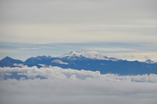View of the Sierra Nevada de Santa Marta mountain range, in Santa Marta, Magdalena department, Colombia, on December 1, 2025. (Photo by Diana SANCHEZ / AFP)