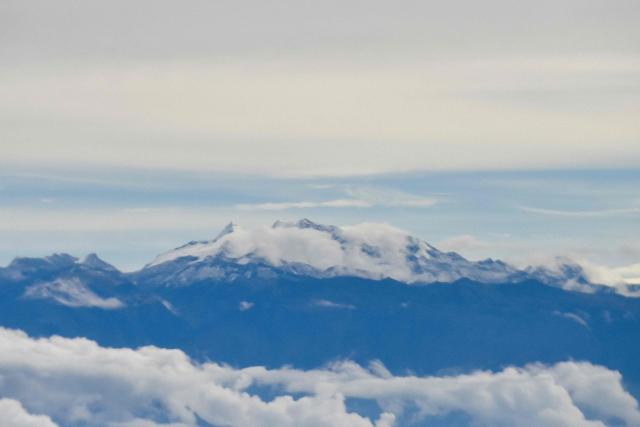 View of the Sierra Nevada de Santa Marta mountain range, in Santa Marta, Magdalena department, Colombia, on December 1, 2025. (Photo by Diana SANCHEZ / AFP)