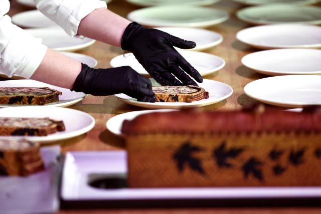 French chef Jonathan Dudek representing France, prepares the dishes with his pate-croute creation during the 16th Edition of the 2025 Pate-Croute World Championship, in Lyon, central-eastern France, on December 1, 2025. (Photo by Alex MARTIN / AFP)