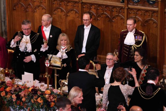 Britain's Prime Minister Keir Starmer sits as a toast is made during the Lady Mayor’s Banquet at the Guildhall in central London on December 1, 2025. (Photo by Adrian DENNIS / AFP)