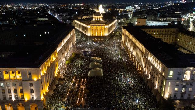A aerial photograph shows the crowd during an anti-government protest in Sofia on December 1, 2025. Tens of thousands of people held anti-government protests in Bulgaria on Monday, widening an anti-corruption movement sweeping the European Union's poorest country as it prepares to adopt the euro. (Photo by Nikolay DOYCHINOV / AFP)