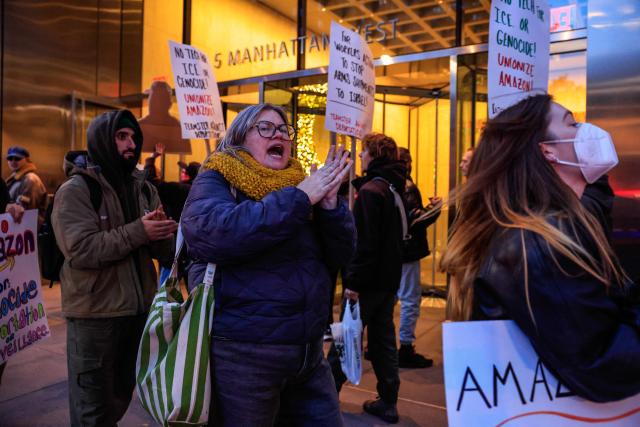 Demonstrators protest against Amazon on "Cyber Monday" outside Amazon Corporate Offices in New York City on December 1, 2025. (Photo by kena betancur / AFP)