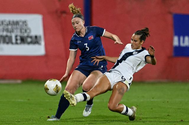 Bermuda's defender #03 Victoria Davis and Guatemala's forward #09 Hannan Woolery fight for the ball during the Women Concacaf W qualifiers football match between Guatemala and Bermuda at Manuel Felipe Carrera stadium in Guatemala City on December 1, 2025. (Photo by JOHAN ORDONEZ / AFP)