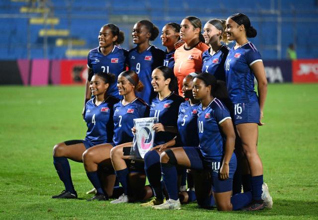 Bermuda players pose for pictures before the Women Concacaf W qualifiers football match between Guatemala and Bermuda at Manuel Felipe Carrera stadium in Guatemala City on December 1, 2025. (Photo by Johan ORDONEZ / AFP)