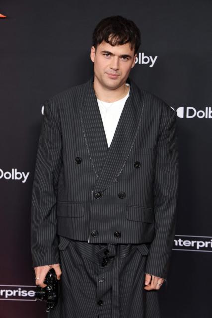 British actor Jamie Flatters attends the premiere of Disney's "Avatar: Fire and Ash" at the Dolby theatre in Hollywood, California on December 1, 2025. (Photo by VALERIE MACON / AFP)