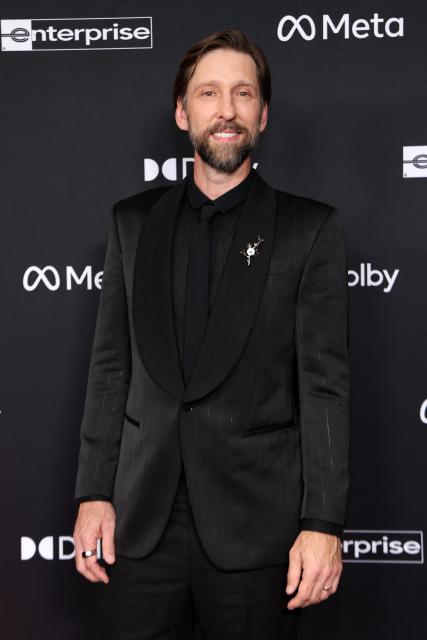 US actor Joel David Moore attends the premiere of Disney's "Avatar: Fire and Ash" at the Dolby theatre in Hollywood, California on December 1, 2025. (Photo by VALERIE MACON / AFP)