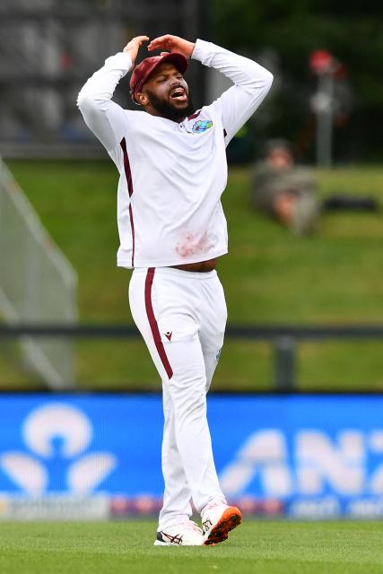West Indies' John Campbell reacts after one of his teammate dropped a catch during day one of the first Test cricket match between New Zealand and West Indies at Hagley Oval in Christchurch on December 2, 2025. (Photo by Sanka Vidanagama / AFP)